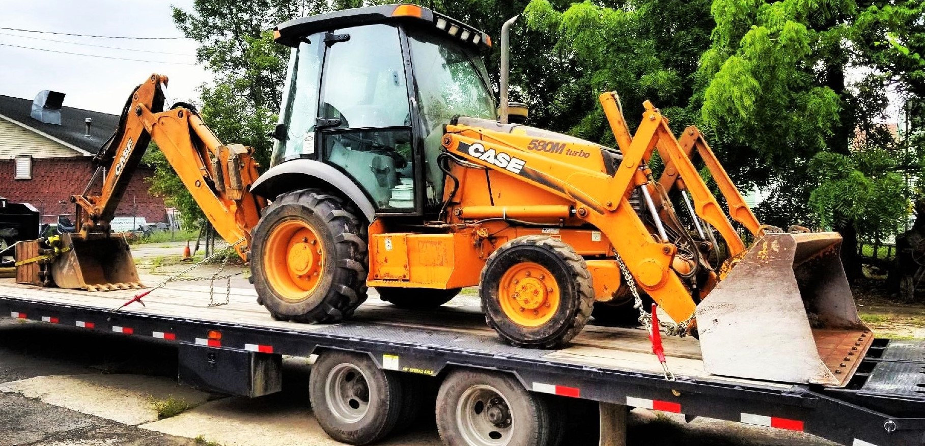 Backhoe Loader Transport Services, Quotes | Freedom Heavy Haul