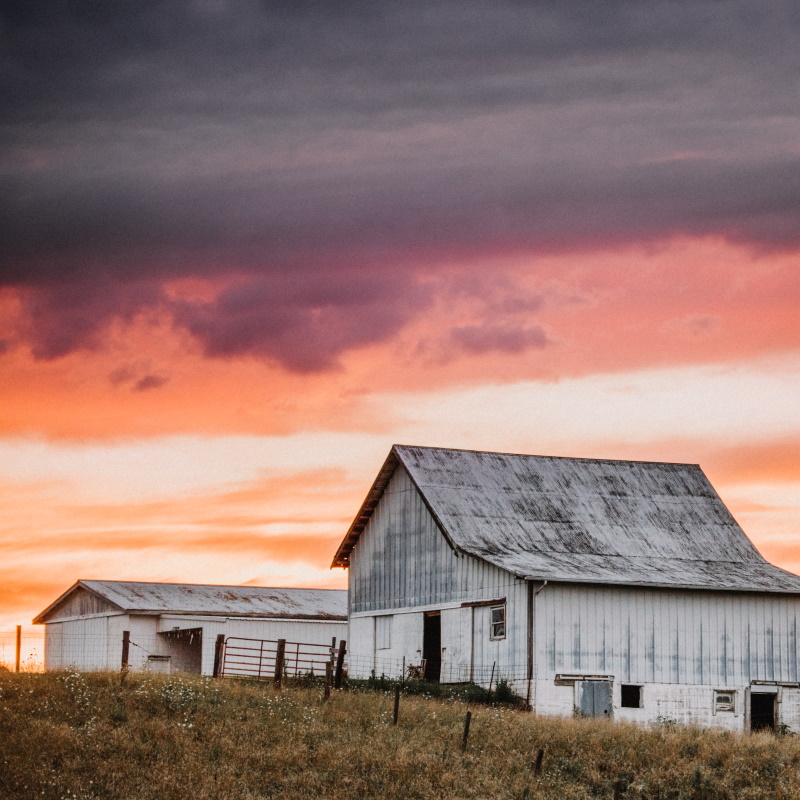 a barn landscape with a beautiful indiana sunset BRWUMS