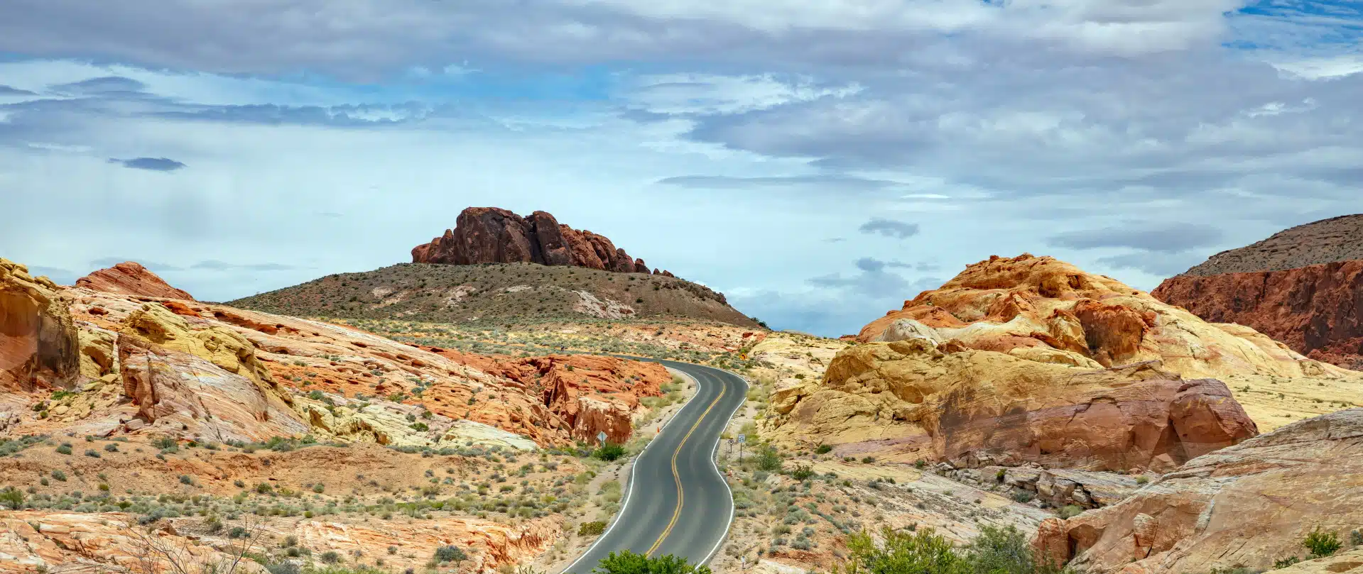 long winding highway with ups and downs cloudy blu MVNH