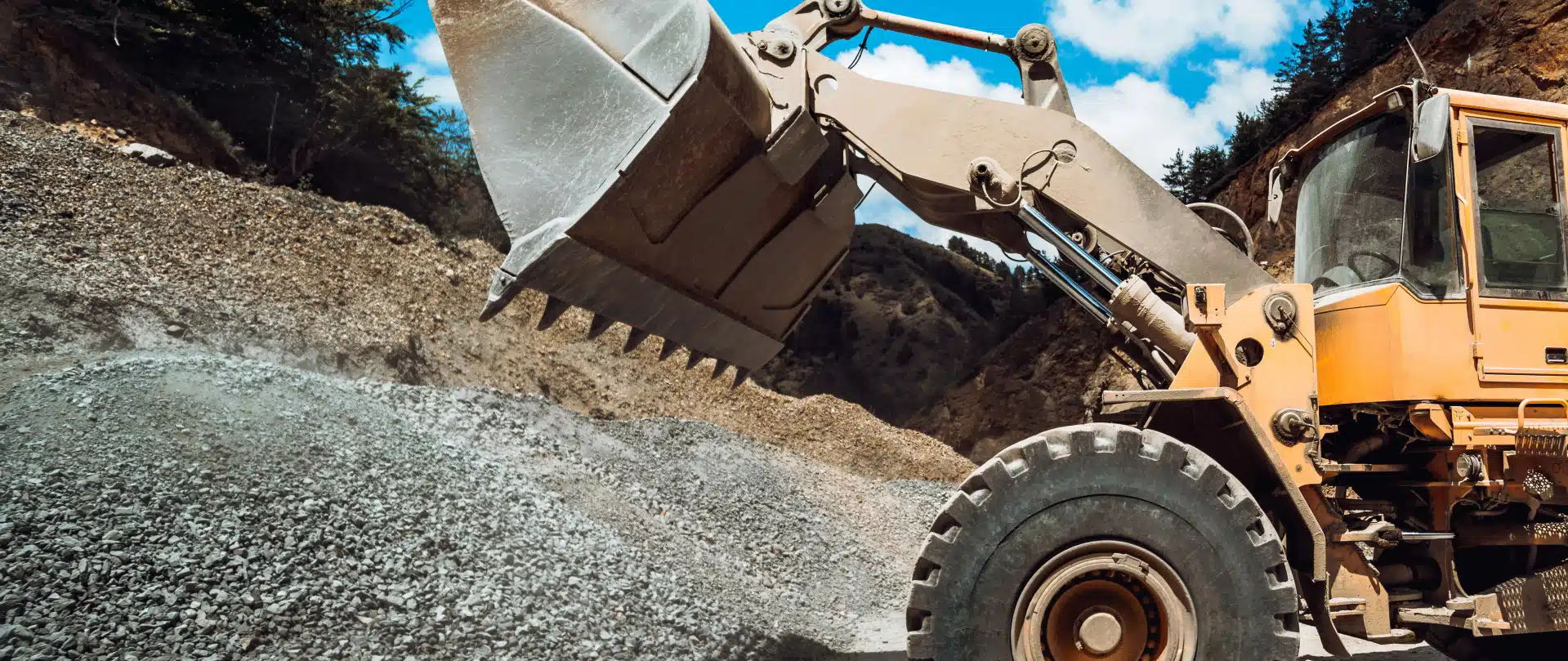 heavy duty machinery loading gravel and transport       utc