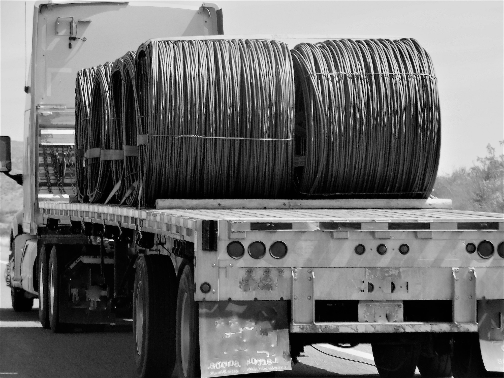 Big Rig Semi Truck Hauling Flat Bed Filled with Coils of Wire!
