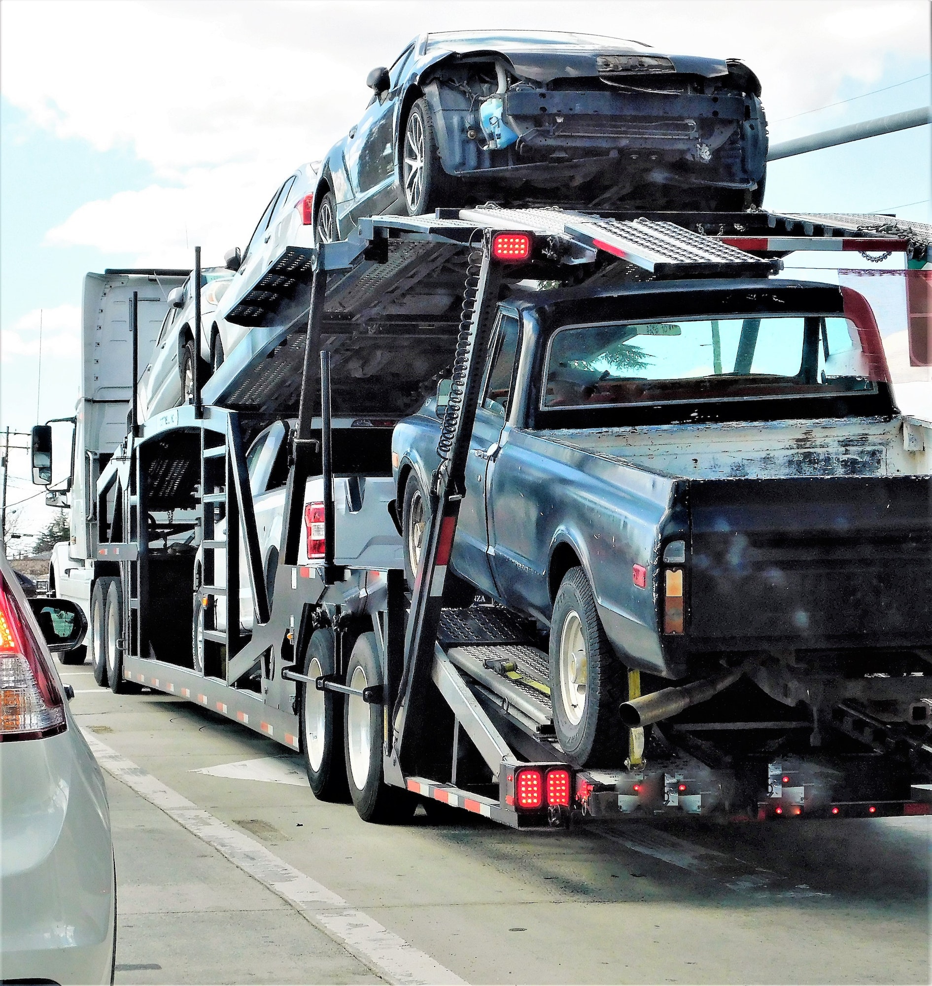 Car Hauler Trailer Filled with Vehicles!