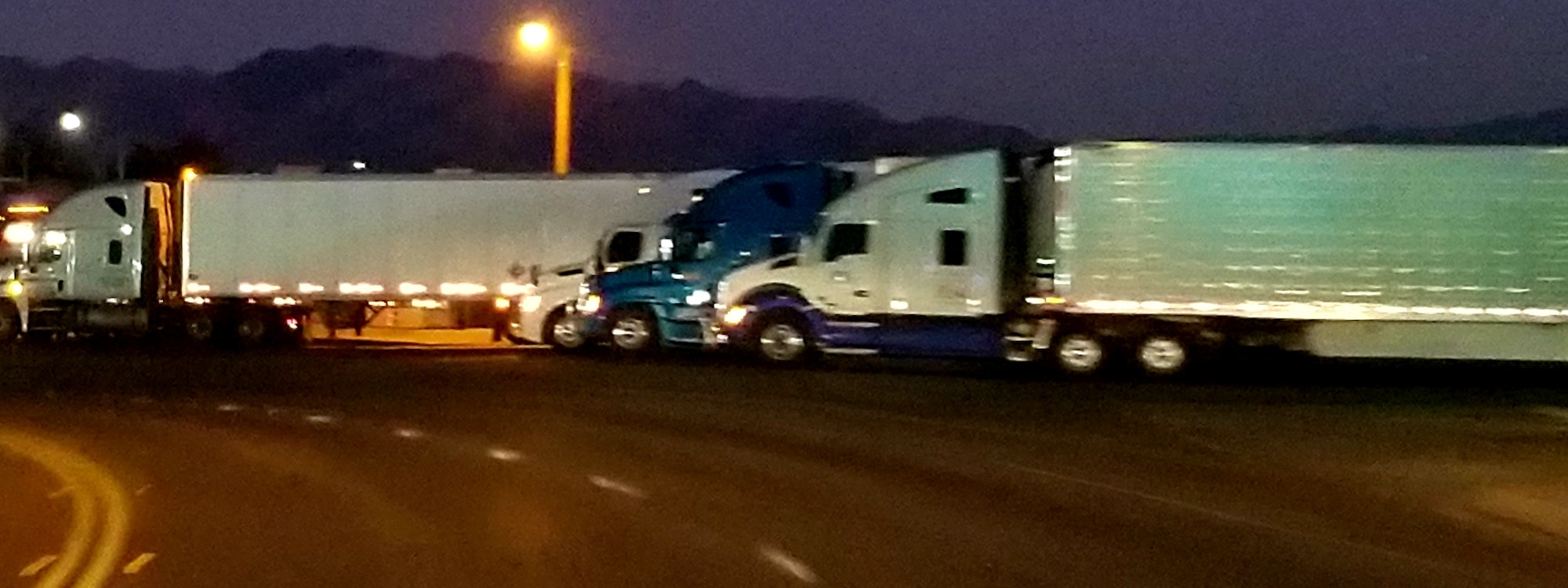 Truckers! Parked at Night! Headlights Reflecting!